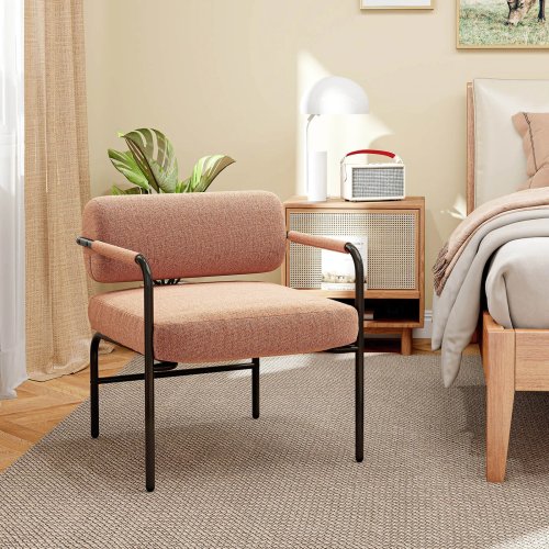 Poltrona decorativa moderna estofada em veludo com encosto cilíndrico e braços metálicos