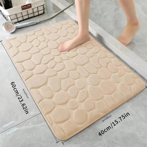 Badmat met kiezelstructuur, traagschuim (memory foam), wateropnemend en antislip