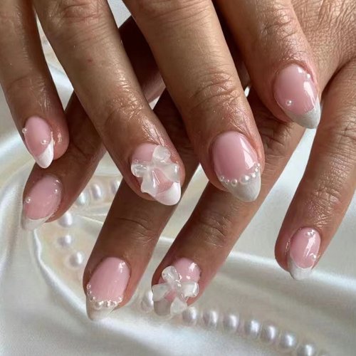 24 Unid. Unhas Postiças Curtas Ovaladas Brancas com French, Laço e Pérolas — press-on acrílicas