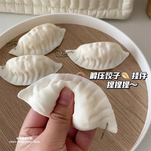 Squishy antiestrés en forma de dumpling con música — colgante/llavero, juguete divertido y regalo