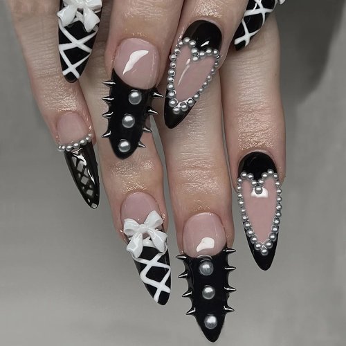 Ongles press-on noirs Halloween motif chauve‑souris, forme amande, faux-ongles acryliques décor rivet et nœud, 24 pièces réutilisables