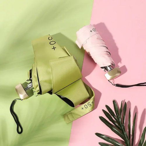 Dù gấp mini bỏ túi — che mưa và chống nắng UV, vỏ vinyl, kích thước nhỏ gọn (capsule)