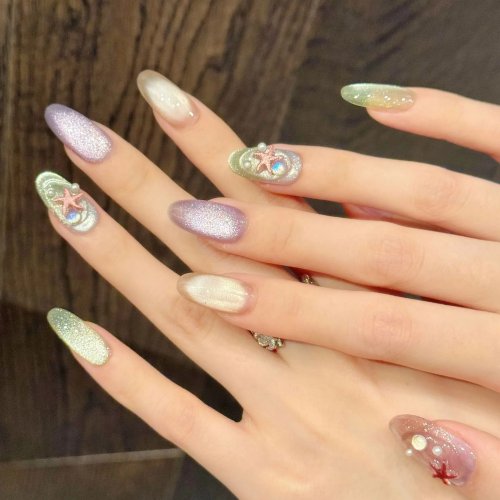 Pack de 10 uñas postizas press-on ovaladas con diseño estrella de mar y olas, efecto cat eye colorido, brillo, hechas a mano