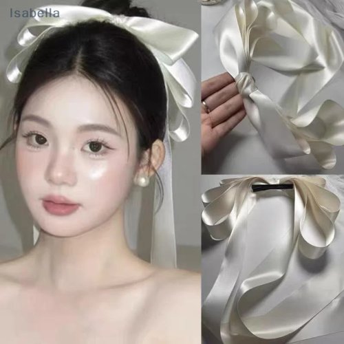 Clip para cabello con moño blanco grande y cintas largas — tocado de novia y accesorio para sesión de fotos