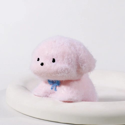 Perrito squishy antiestrés 'slow‑rise', suave con retorno lento, con sonido/música — viral en TikTok