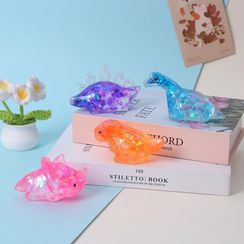 Squishy dinosauro — Giocattolo morbido con imbottitura tipo marshmallow, estensibile antistress con luce lampeggiante, 4 colori, bomboniere (colore/stile casuale)