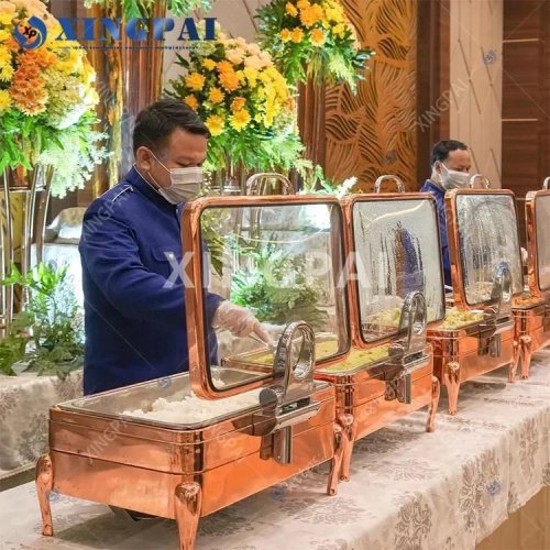 Bộ chafing dish XINGPAI inox màu vàng hồng sang trọng, có cơ cấu thủy lực cho buffet/nhà hàng