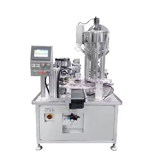 Macchina automatica per il riempimento e la sigillatura di cucchiaini con miele