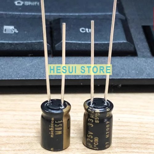 Condensateur électrolytique audio Nichicon MUSE KZ 33 µF 25 V (8×11,5 mm) noir, pattes or/cuivre