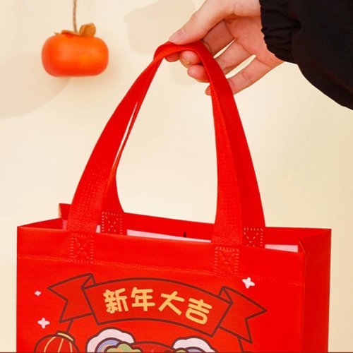 Bolsa de presente Ano Novo em TNT (não tecido), dobrável com pegas — estampado sorte e fortuna