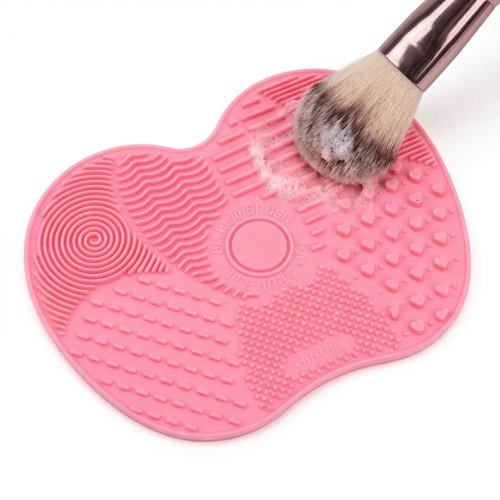 Pink silicone makeup brush cleaning mat with suction base — zoned textures for all brushes & beauty tools