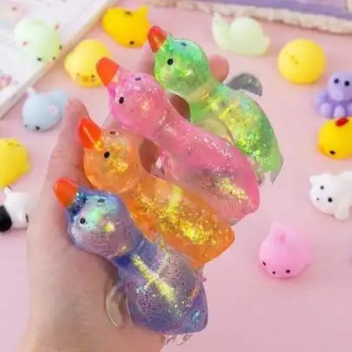 Squishy antistress glitter (oca/anatra/pinguino e animali), morbido, slow‑rise, leggermente appiccicoso, portatile