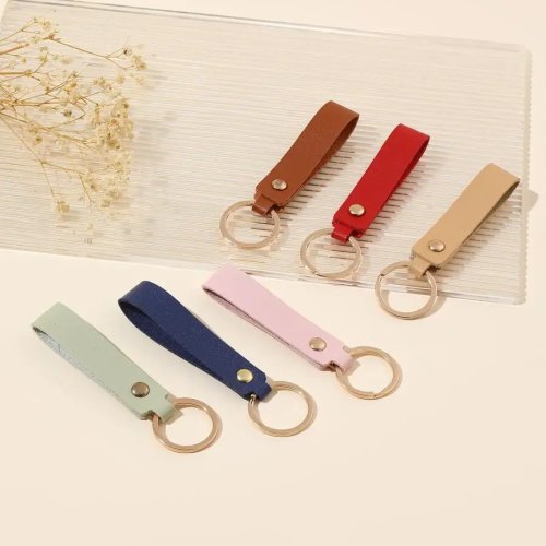 Set de 6 llaveros de piel sintética (PU) multicolor – adorno para bolso y auto, regalo casual para adultos