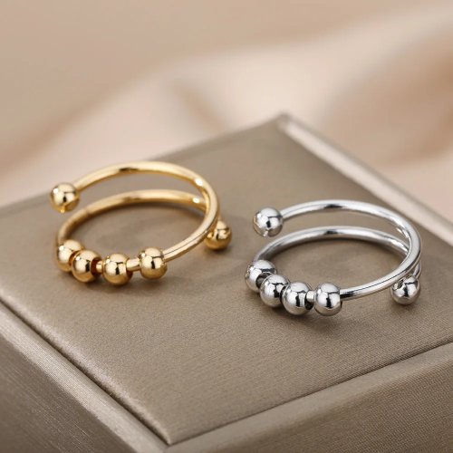 Draaibare anti-stress ring voor dames, verstelbaar rvs met kralen en open design — spinner/fidget ring, cadeau