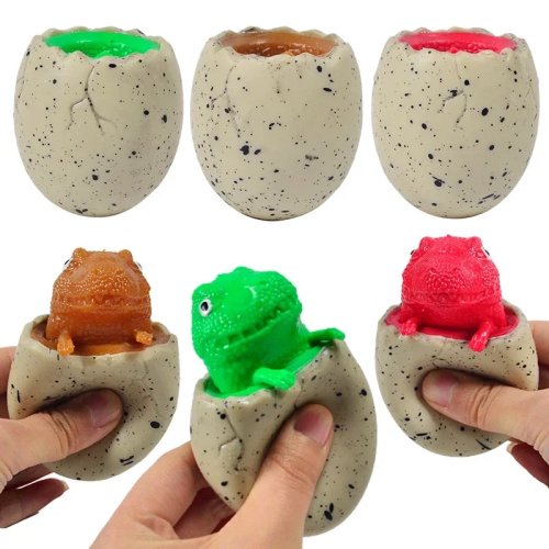 Dinosaurus-ei om te knijpen en uit te laten komen voor kinderen – T‑Rex met muziek, anti-stress squishy, grap/decoratie