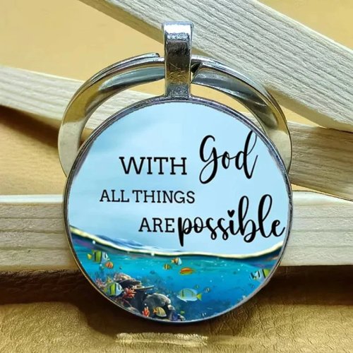 Christelijke sleutelhanger, ronde glazen cabochon met oceaan/vissen print en metalen ring — inspirerend cadeau 'Met God is alles mogelijk'