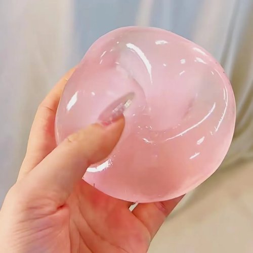 Squishy artesanal Flor de Cerezo, rebote lento — bola antiestrés con aceite de coco y maltosa