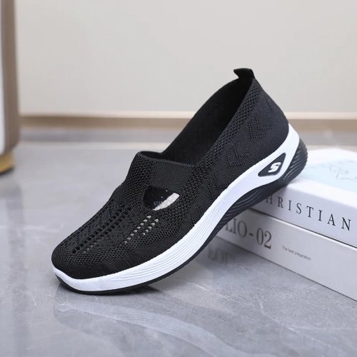 Zapatillas casual de mujer en malla con tira en T recortada y suela cuña acolchada