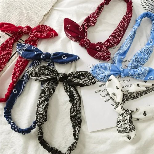 Diadema elástica ancha estampada con orejas de conejo y nudo – banda para cabello para mujer y niña