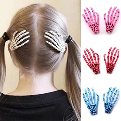 1 paar haarclips met schedel en skelet-hand — gothic stijl