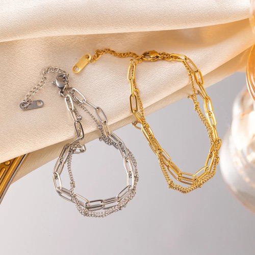 Gelang wanita lapis ganda dengan rantai samping, dari baja titanium — minimalis dan elegan