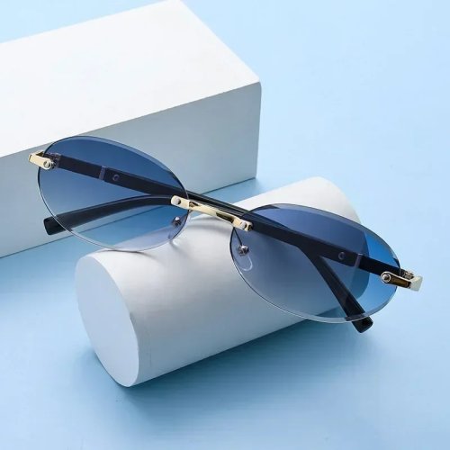 Kính râm oval nhỏ không gọng UV400 — Nhẹ, unisex, tiện dụng cho du lịch