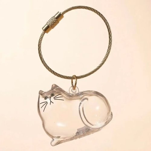 Transparante capsule-sleutelhanger voor kattenhaar — gashapon-stijl aandenken
