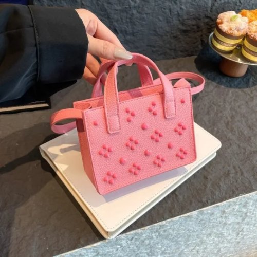 Versatile Leather Tote and Diaper Bag for Commuters