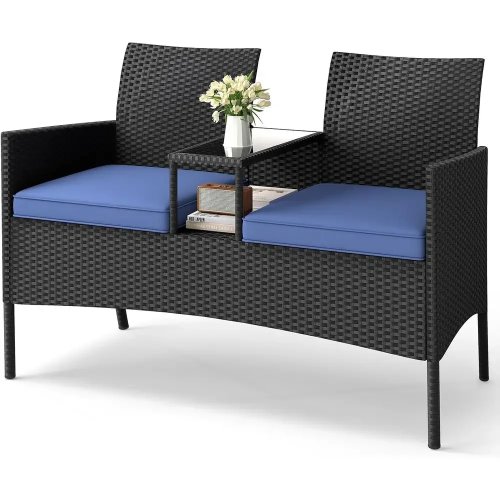 Rieten tuinbank met tafel van gehard glas en kussens