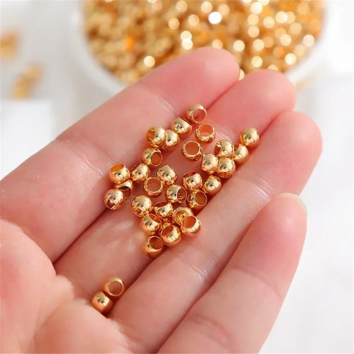 Perle rotonde di posizionamento placcate oro 18K per gioielli fai da te