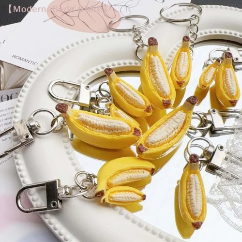 【M】Dije antiestrés de banana boat – Llavero de resina hecho a mano, peluche relajante con emoticón que alivia el estrés para estudiantes