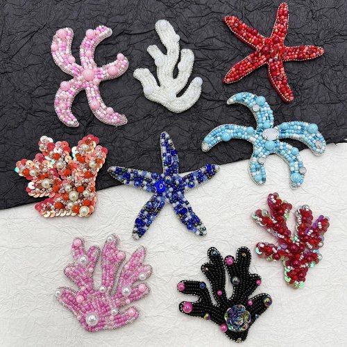 Accessori e toppe per abbigliamento fai da te con perline stella marina e corallo