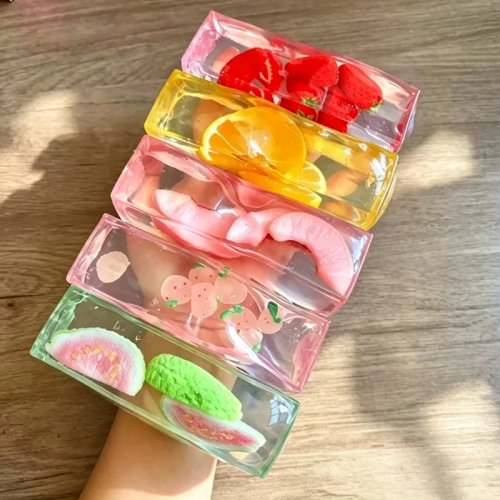 Pelota antiestrés squishy de gelatina de fruta transparente – Juguete sensorial fidget cubo de hielo